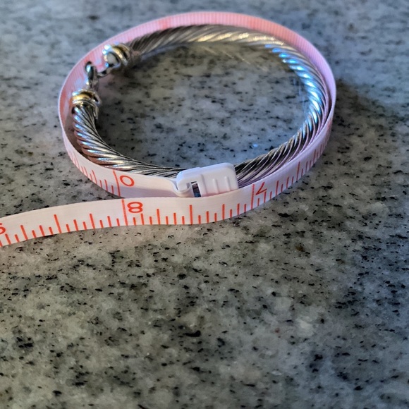 Gold and Silver tone bracelet with clasp closure. - Picture 2 of 3